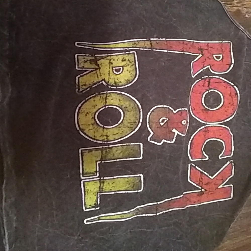 A shirt that says rock and roll